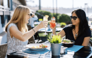 What makes coastal seafood dining experiences so popular with travellers?